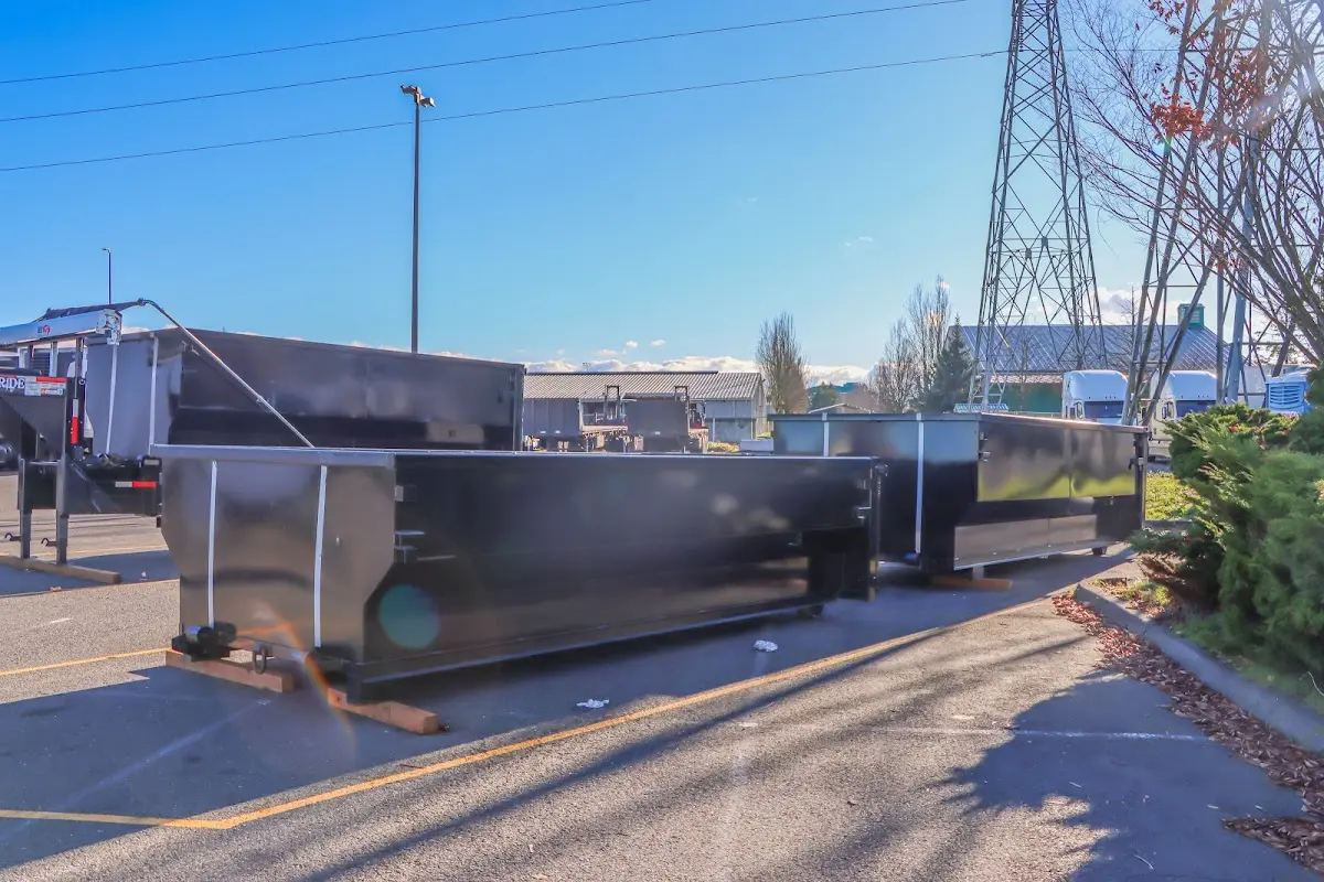 Roll-off dumpster ready for waste disposal at job site for Concrete Dumpster Rental in Long Beach